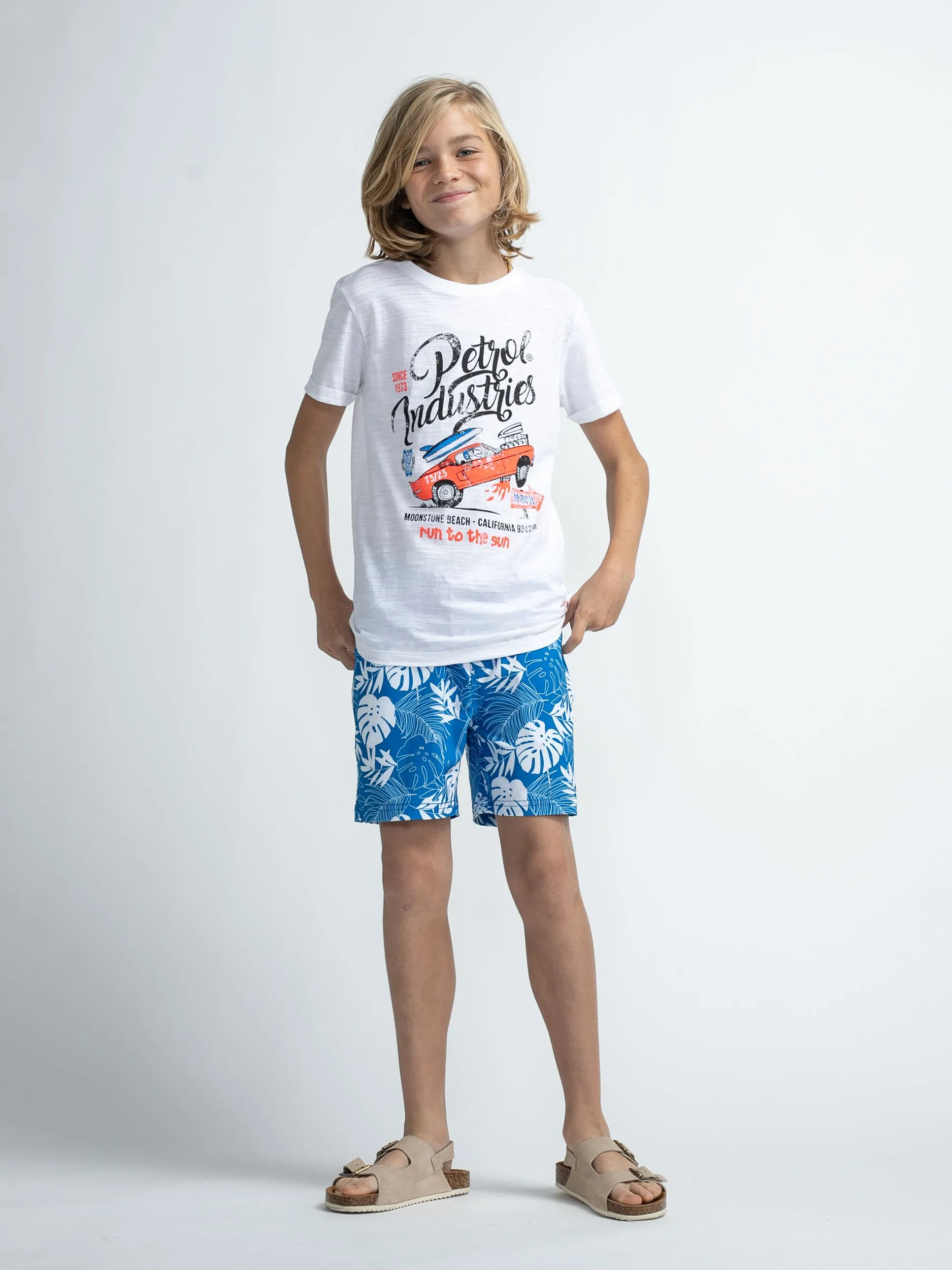 Botanical-print swimming shorts