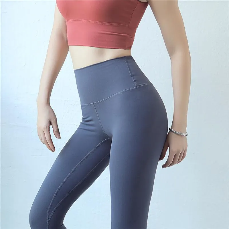 New European and American hip fitness pants Female high waist peach hip running tight feet sports yoga pants